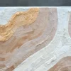Luxury designer rug with rounded corners, in beige and cream, featuring abstract topographic lines.