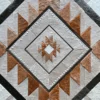 Luxury designer rug featuring geometric concentric diamonds with brown, gray, and white textured triangles handcrafted in high end hide.