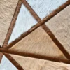 Silhouette Hide 14495 designer rug with geometric brown and white panels, showcasing luxury handmade hide craftsmanship.