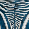 Close-up of Zebra Hide 15581, a luxury custom blue and white designer rug with animal-inspired pattern.