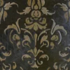 Close-up of Boulle Hide 29148, a luxury designer rug with dark textured hide and ornate gold damask pattern.