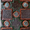 Ignition Hide 27421 luxury designer rug with geometric orange and green shapes, handmade hide, brown and gray furry texture.