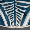 Close-up of luxury designer rug, Zebra Hide 15581, with blue and white textured abstract zebra pattern.