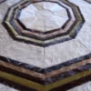 Close-up of luxury designer rug with geometric patterns in multicolor handmade hide, Cannes Hide 28143.