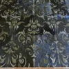 Boulle Hide 29148 is a luxury designer rug with ornate floral patterns and a light hide border.