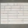 Beltway Hide 25131 luxury designer rug with white textured geometric pattern and gray accents.