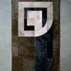 The Prisma Hide 14674 is a luxury designer rectangular rug with geometric patterns in black, brown, beige, and gray.