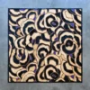 Bloom Hide 15106 is a luxury designer rug with irregular black, beige, and blue shapes on gray.