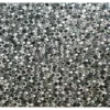 Designer rug with overlapping crescents in gray, white, and green for luxury interiors.