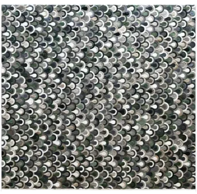 Designer rug with overlapping crescents in gray, white, and green for luxury interiors.