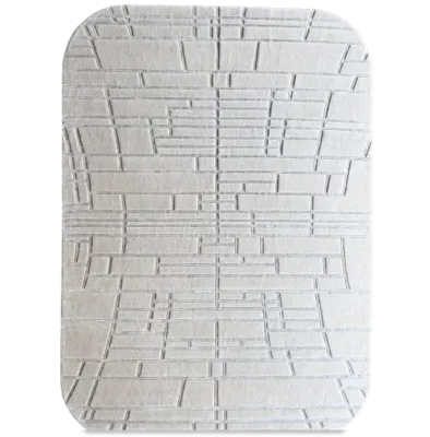 Luxury designer rug in white, handmade wool style with an embossed geometric pattern.