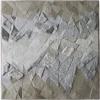 Upward Hide 26163 luxury designer rug features abstract gray and beige patchwork with geometric handmade hide design.