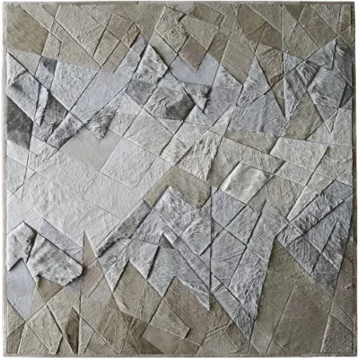 Upward Hide 26163 luxury designer rug features abstract gray and beige patchwork with geometric handmade hide design.
