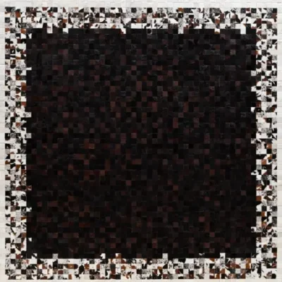 High end designer rug with a central dark grid, framed by light mosaic-inspired accents.