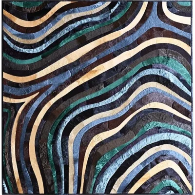Luxury designer rug with wavy, layered blue and earth-tone stripes in a high-end modern pattern.