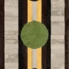 Luxury designer rug with vertical stripes, circles, and triangles in brown, beige, yellow, and green.