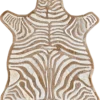 Zebra Hide 16332 is a high-end designer rug with white and tan stripes, handmade hide on black.