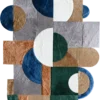 Luxury designer rug with geometric abstract shapes in earthy tones, featuring a textured high-end handmade hide rug finish.