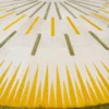 Luxury designer rug with radiating yellow, olive green, and white lines on a textured high end handmade hide rugs surface.