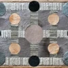 Atlas Hide 30060 is a high end designer rug with geometric gray, beige, and black shapes in a handmade hide finish.