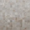 A grid of beige and light brown squares evokes luxury custom designer rugs in hide.