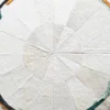 Luxury custom hide rug featuring a white segmented circle and bold designer accents.