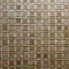 Close-up of luxury handmade hide rug, Custom Hide 15284, with a designer grid in brown, beige, and green.