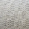 Luxury designer rug featuring a 3D geometric pattern in gray and beige, inspired by high-end handmade hide rugs.