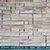 Grid of metallic-look blocks with colorful lines, inspired by handmade luxury designer hide rug.