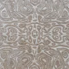Luxury handmade wool and silk designer rug with abstract concentric beige shapes.