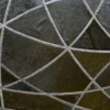 A close-up of Silhouette Hide 27680 shows curved silver lines on a luxury designer handmade hide rug.