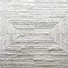 Faceta Hide 15388 luxury designer rug with geometric, fur-textured tiles in white and gray.