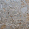 Hide 29827 luxury designer rug with textured abstract surface, raised patterns, and metallic gray handmade hide rug detailing.