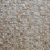 Close-up of Surrender Hide 15561 luxury designer rug, handmade with beige and light brown textured hide tiles in a high-end grid pattern.