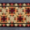 The Fancy Hide 16177 designer table runner features high-end quilted geometric star patterns in luxury handmade hide rug style.