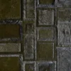 Luxury designer rug with dark rectangular and square hide panels in a geometric pattern.