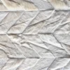 Close-up of Lance Hide 14723 luxury designer rug with chevron handmade hide tiles.