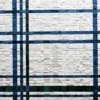 Luxury designer rug with a blue and dark green grid on textured white, handmade hide style.