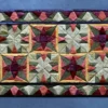 The Fancy Hide 16177 designer rug showcases luxury handmade hide patterns in rich colors.