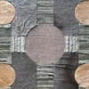 Atlas Hide 30060 designer rug with central and corner circles in luxury handmade hide and leather-like textures.