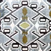 Luxury designer rug with geometric blue, white, black, and gold diamond pattern.