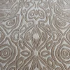 Close-up of luxury designer rug, Urushi Silk Wool 15647, showing handmade beige and light brown abstract raised patterns.