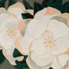 Close-up of luxury designer rug, featuring embroidered white florals on a neutral high end handmade textile.