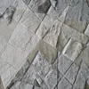 Upward Hide 26163 is a luxury designer rug with geometric gray and beige faux fur patches.