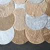 Overlapping circles of premium Custom Hide 29357 on a dark surface, luxury designer rug.