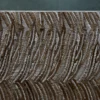 Luxury designer rug with wavy brown and beige lines, handmade hide and wool.