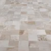 A floor with beige and light brown tiles, perfect for luxury custom or designer rugs display.