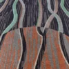 Luxury designer wool rug with wavy lines in brown, gray, black, and green hues.
