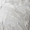 Close-up of the Lexar Hide 15275 luxury designer rug with geometric handmade hide patchwork.