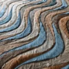 Close-up of Flow Hide 29116 luxury designer rug with wavy blue, brown, and gray textured hide.